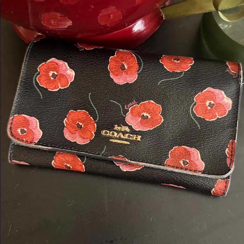 COACH bifold wallet with cute poppy print. Change pocket in back. Snap closure. - Picture 4 of 16